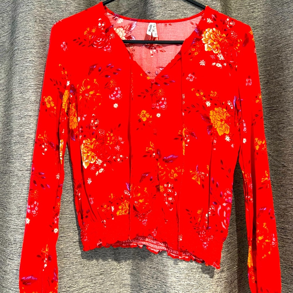 Red floral button up top.